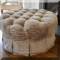 F39. Round tufted ottoman. 20" x 40"  